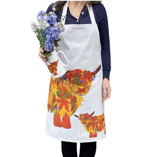 Autumn Leaf Highland Cow Apron - Front View - A Joyful Addition To Any Kitchen