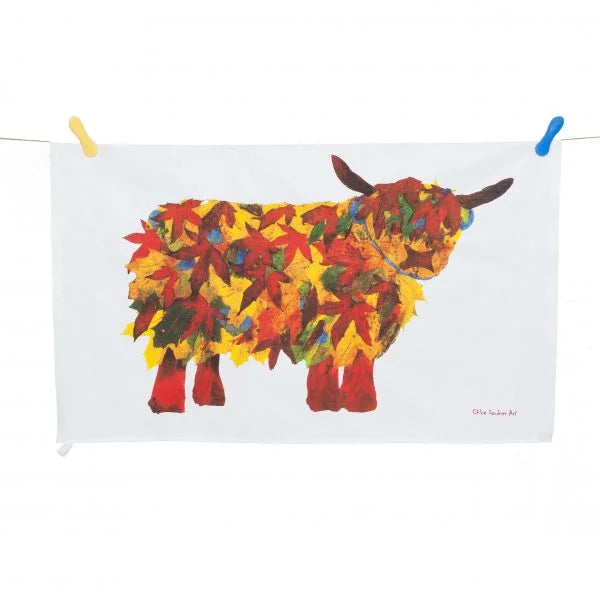 Autumn Leaf Highland Cow Tea Towel - Front View - A Joyful Addition To Any Kitchen