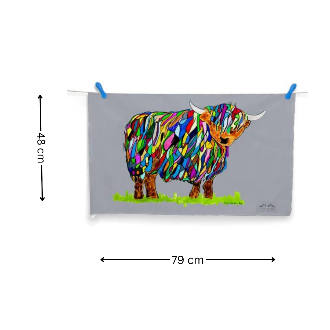 Bright Highland Cow Tea Towel on Grey on washing line with pegs on white background with arrows to indicate measurements of 48 cm x 79 cm.