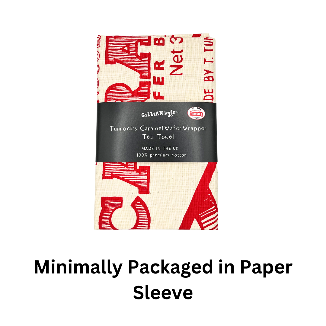 Tunnock's Caramel Wafer Wrapper Tea Towel folded on a white background and in a paper sleeve with text that says "Minimally Packaged in Paper Sleeve"