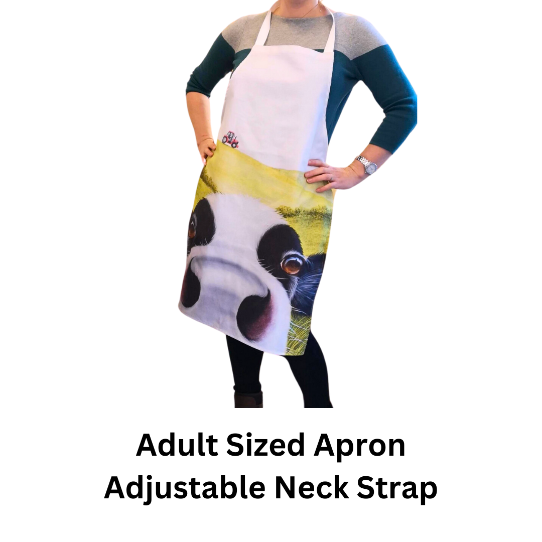 Cow In Pasture Friesian Cow Apron being worn by woman on white background with text which reads "adult sized apron, adjustable neck strap".