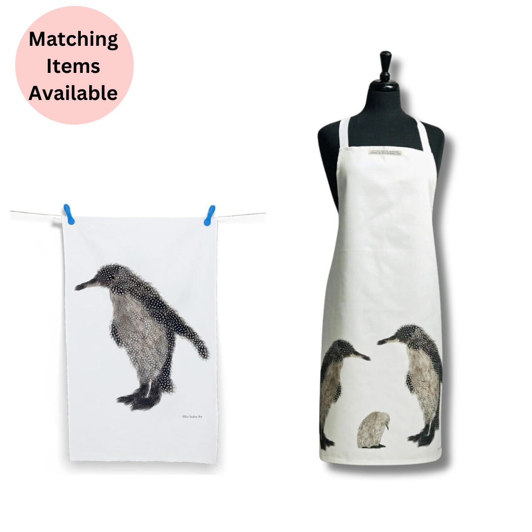 Grey Feather Penguin Pair & Baby Apron and Grey Feather Penguin Apron on white background with pink disc with text which reads "matching items available".