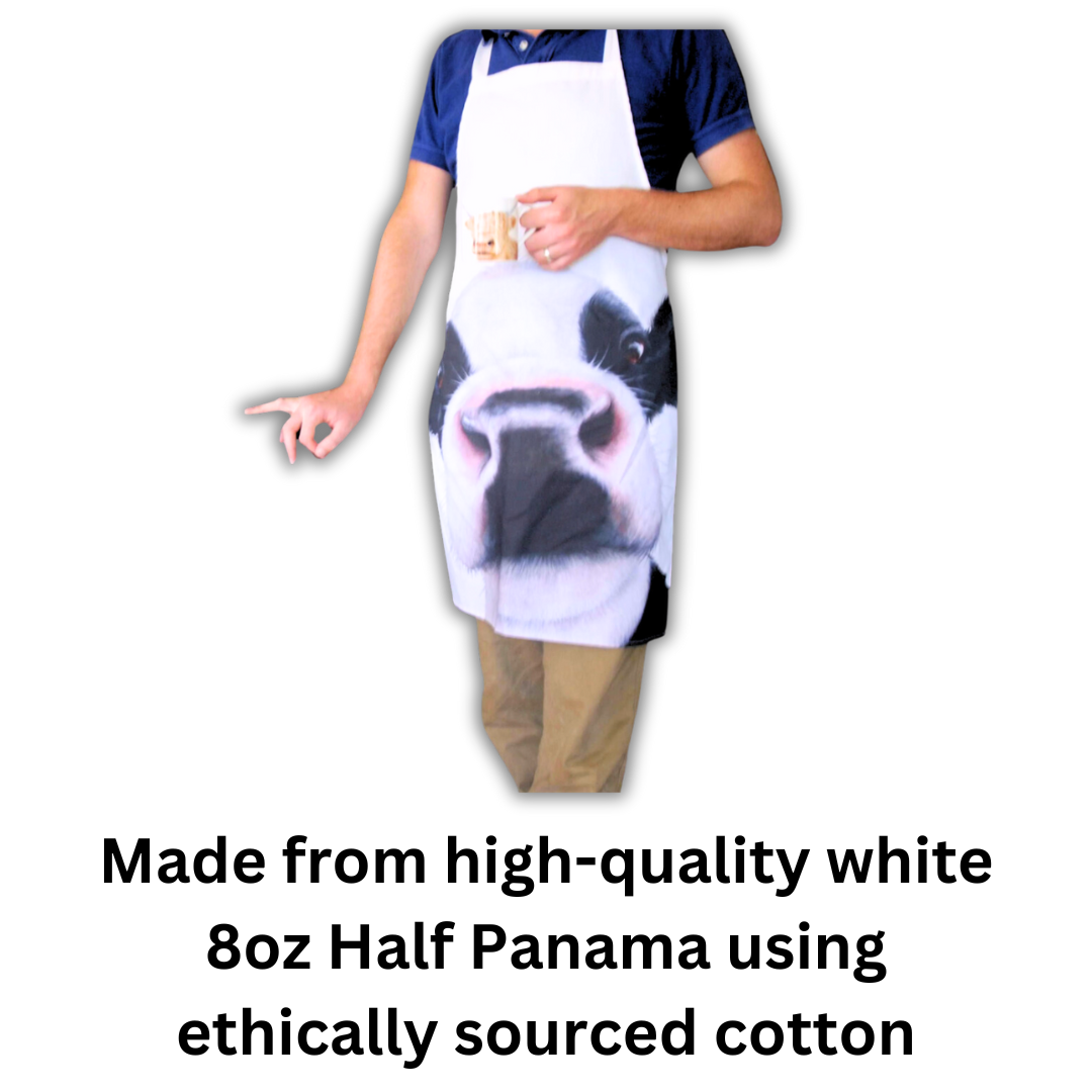 Friesian Black & White Cow Apron being worn by man on white background with text underneath which reads "made from high-quality white 8oz half panama using ethically sourced cotton".