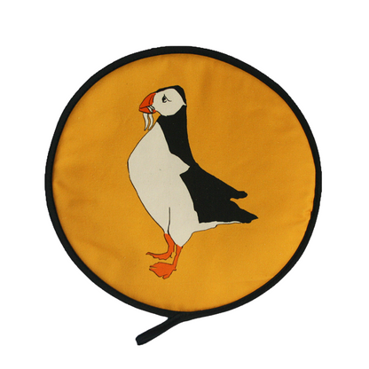 Mustard Yellow Puffin Chef's Pads For Aga - Front View - A Joyful Addition To Any Kitchen