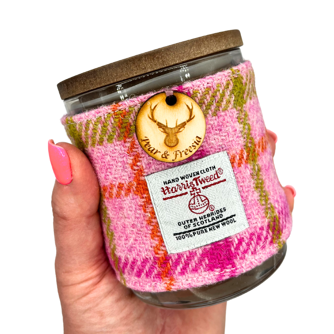 Pear & Freesia Harris Tweed Handmade Soy Candle held in woman's hand