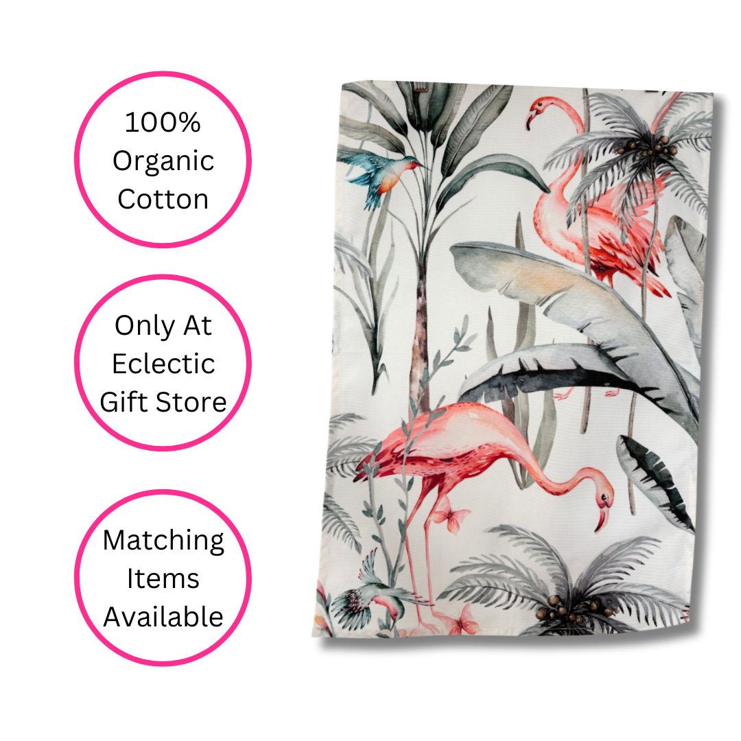 White Tropical Flamingo Tea Towel on white background with three pink discs highlighting the benefits - 100% Organic Cotton, Only At Eclectic Gift Store and Matching Items Available.
